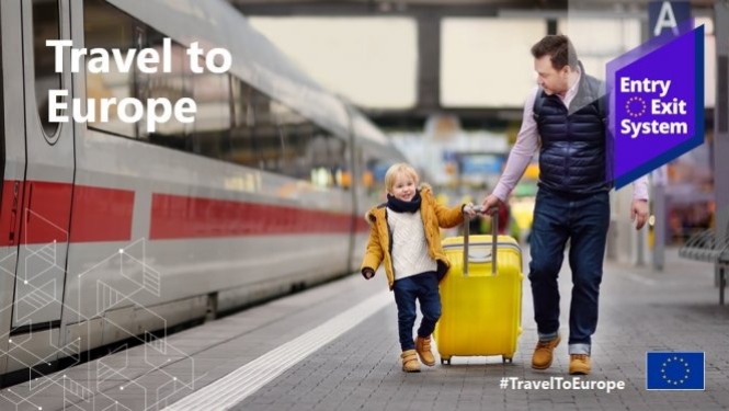 family dragging suitcase
